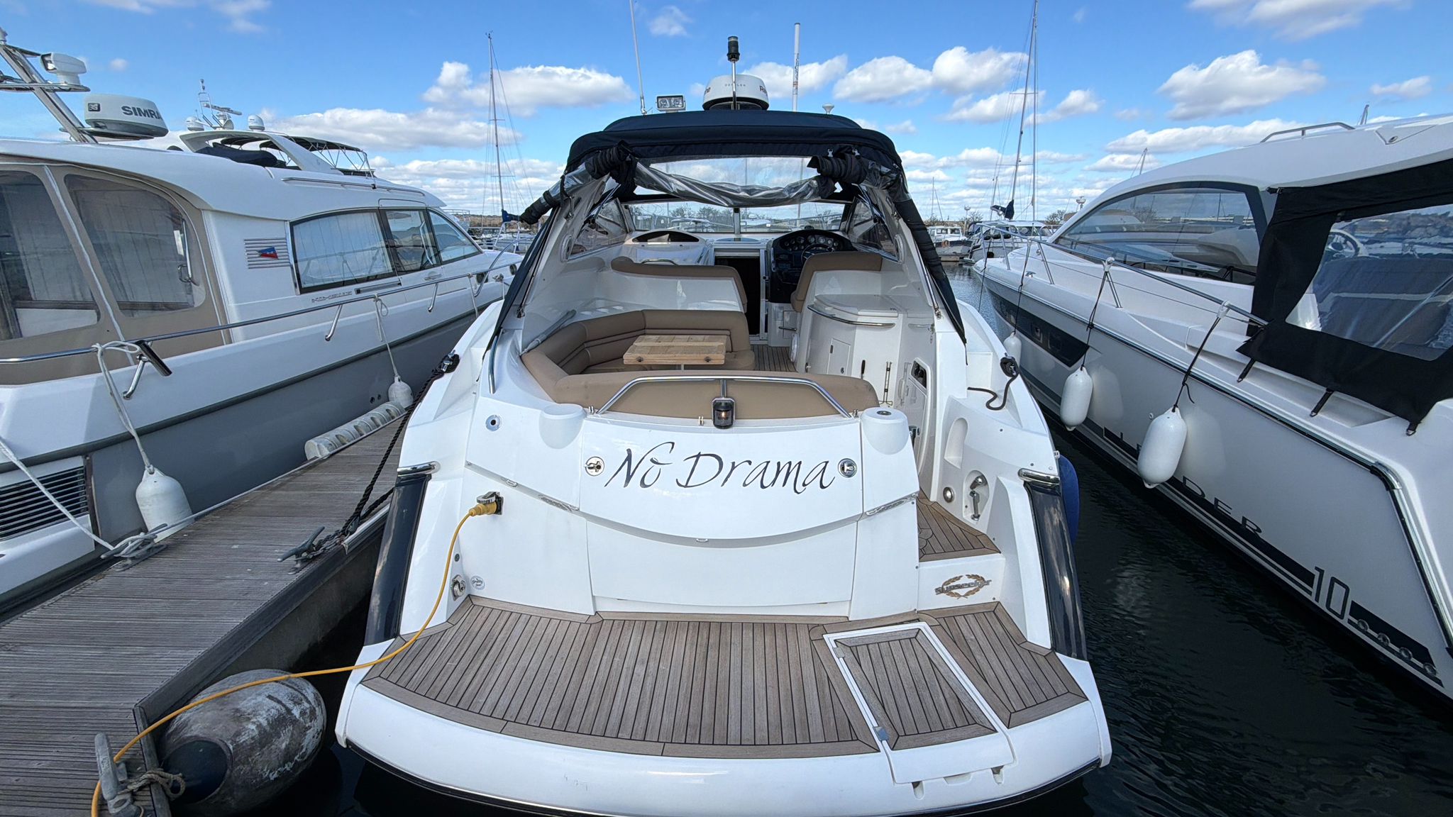 Sunseeker Portofino 35 stern view at marina